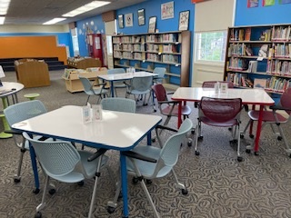 Modern chairs and tables in the Columbus-Lowndes Public Library in downtown Columbus.